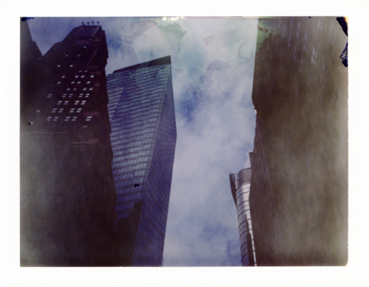 Double exposure. map and buildings, times sq