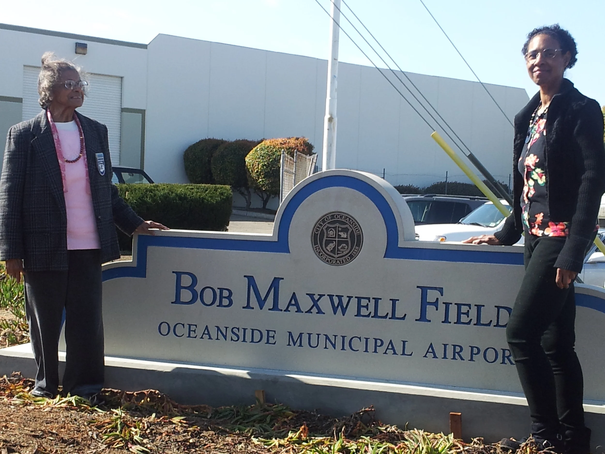 Mrs. Bob Maxwell and their daughter.