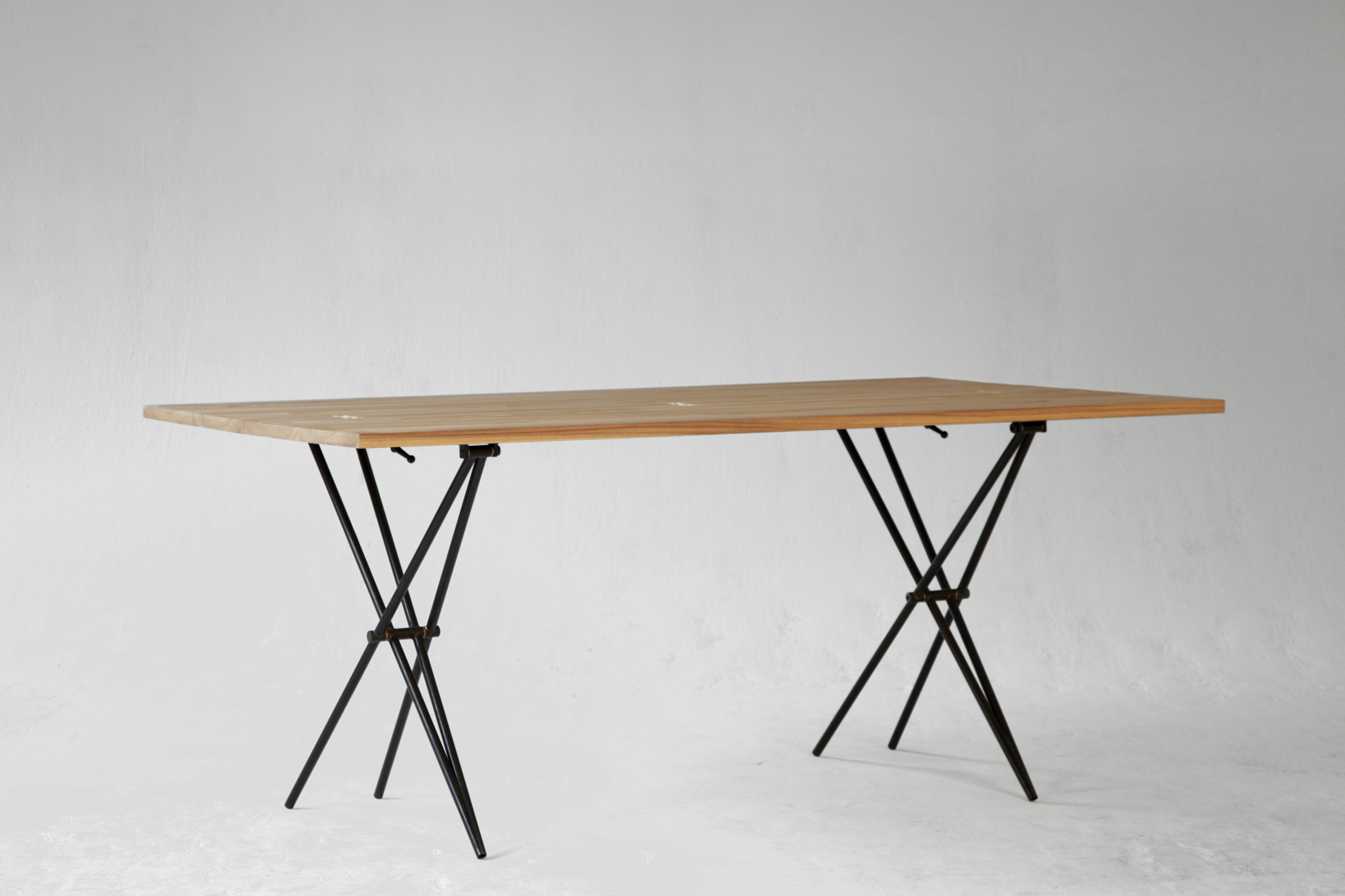 Configured as a 72" by 40" dining table, the Larmer table can seat 6 comfortably, 8 intimately.