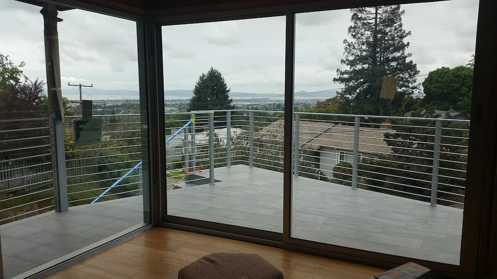 New railings and floor to ceiling Fleetwood doors are in