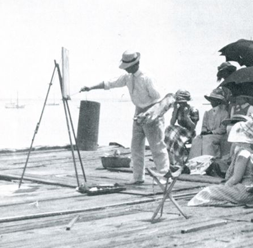 Charles Hawthorne demonstrating at his easel
