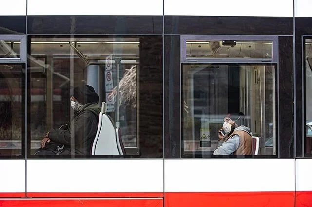 Riders wear various masks on the College streetcar in downtown Toronto. As Ontario continues to re-open, the provincial government announced today that all passengers should wear non-medical masks, if possible, while using any form of public transit.