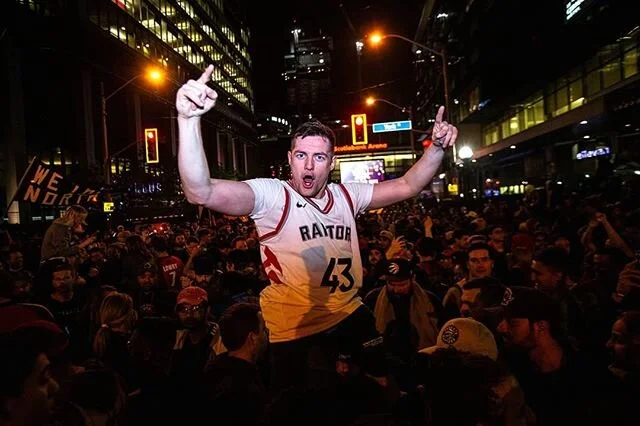One year ago Toronto Raptors took the NBA championship and fans took over the streets! What a fun night to photograph! #wethenorth #thesix #nbachamps #torontoraptors #jurassicpark #toronto #torontophoto #photojournalism #canoncanada