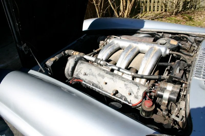 A pre-restoration Roadster engine bay