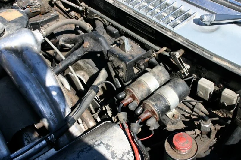 A pre-restoration Roadster engine bay