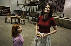 Opera singer Viktoria Vizin (right), with assistant director Leslie Halla, rehearses for the Lyric Opera of Chicago's upcoming production of 'Carmen.' Vizin, a resident of Aurora's far East Side, will perform the lead role.