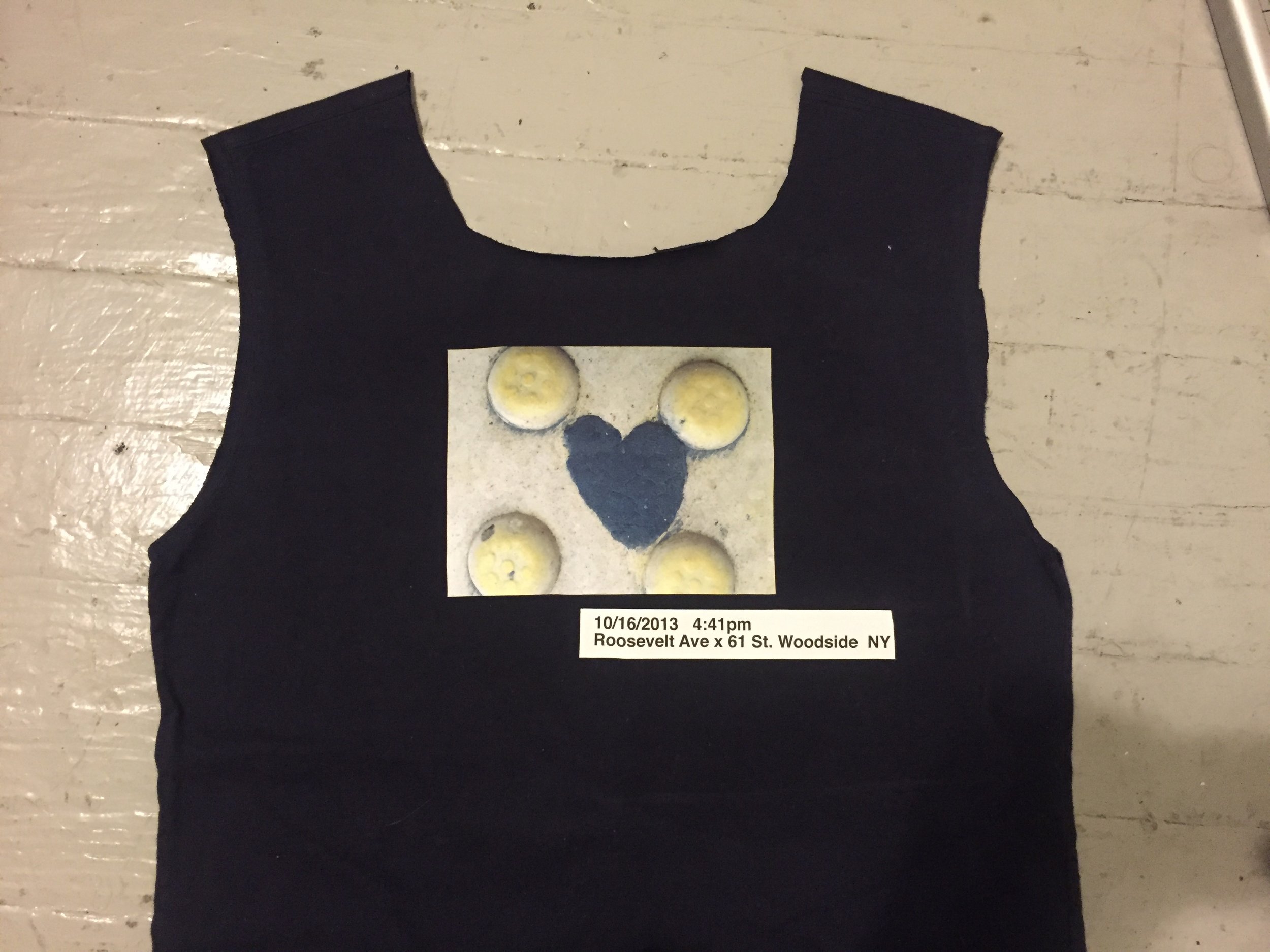 Cut off sleeves. Cut around neck, so opening is wide enough as a bag.