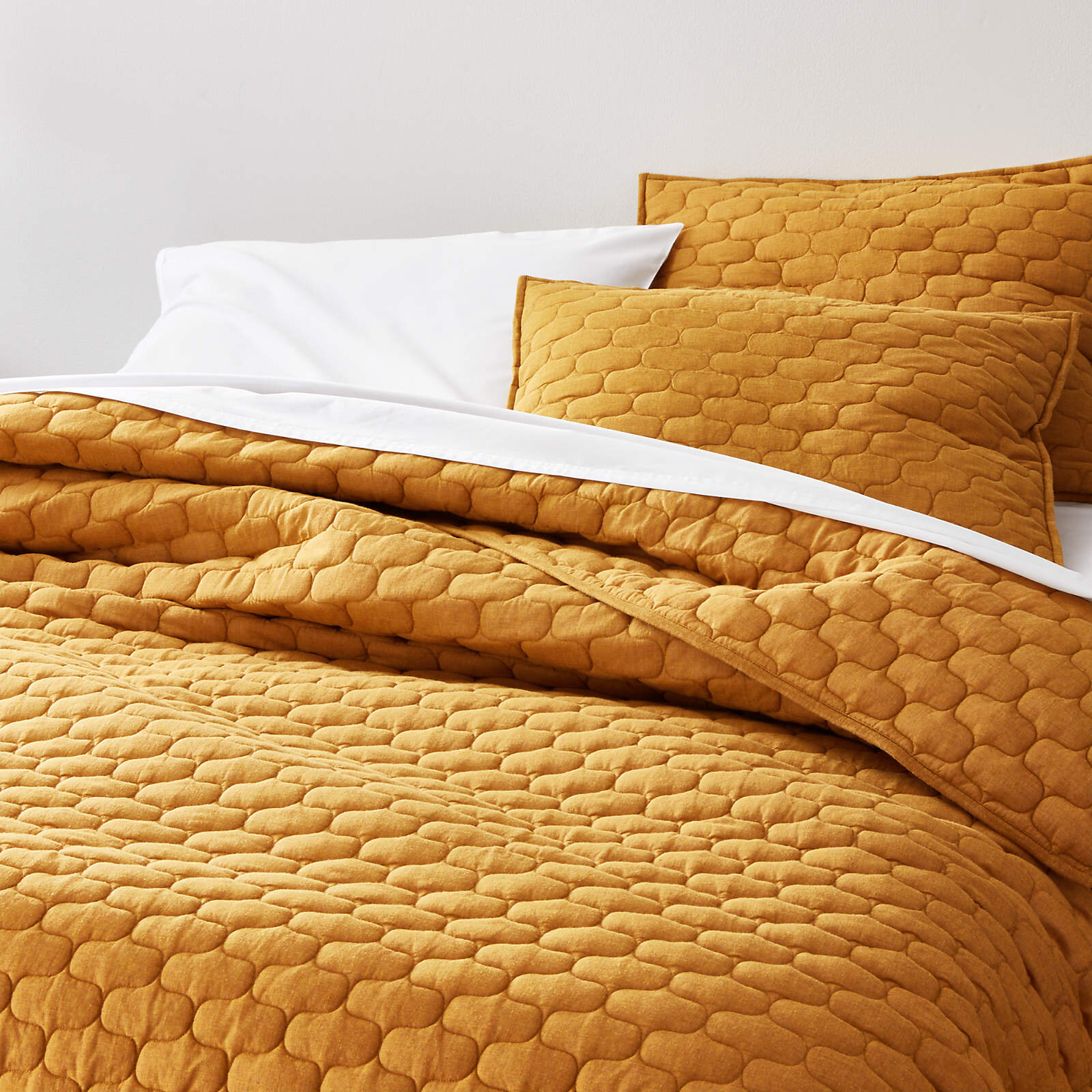 fontaine-mustard-yellow-cotton-quilts-and-pillow-shams.jpg