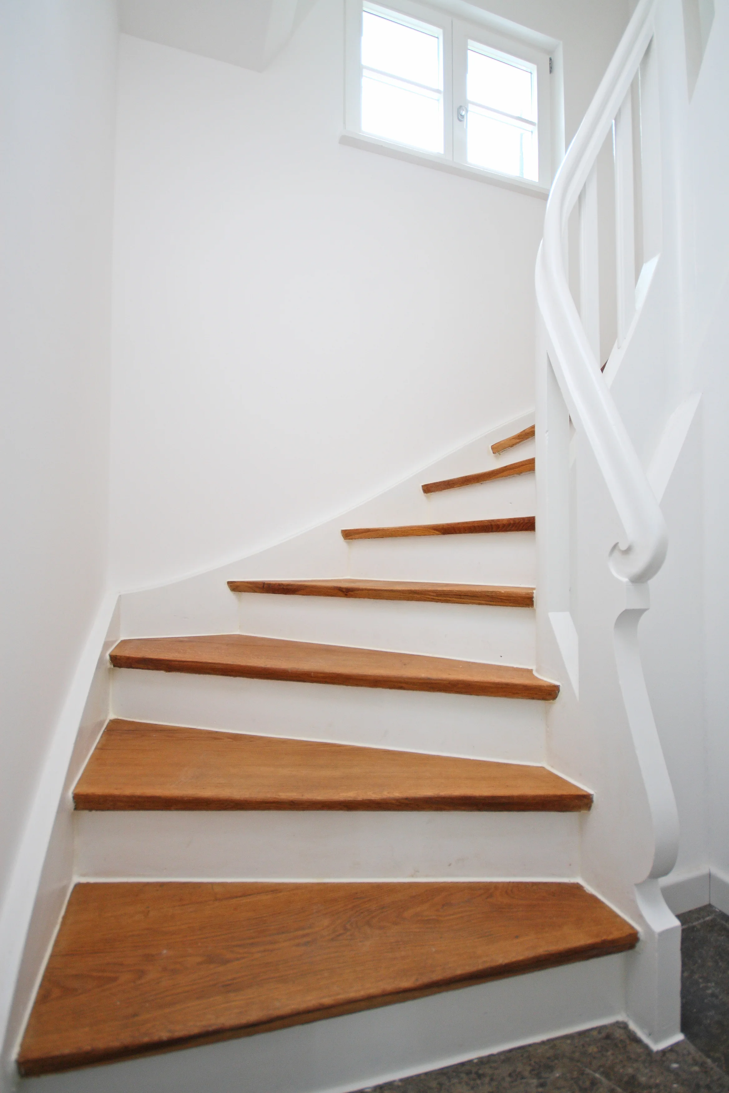 Umbau eines Reihenendhauses mit kieferorthopädischer Praxis, München-Harlaching, 2009