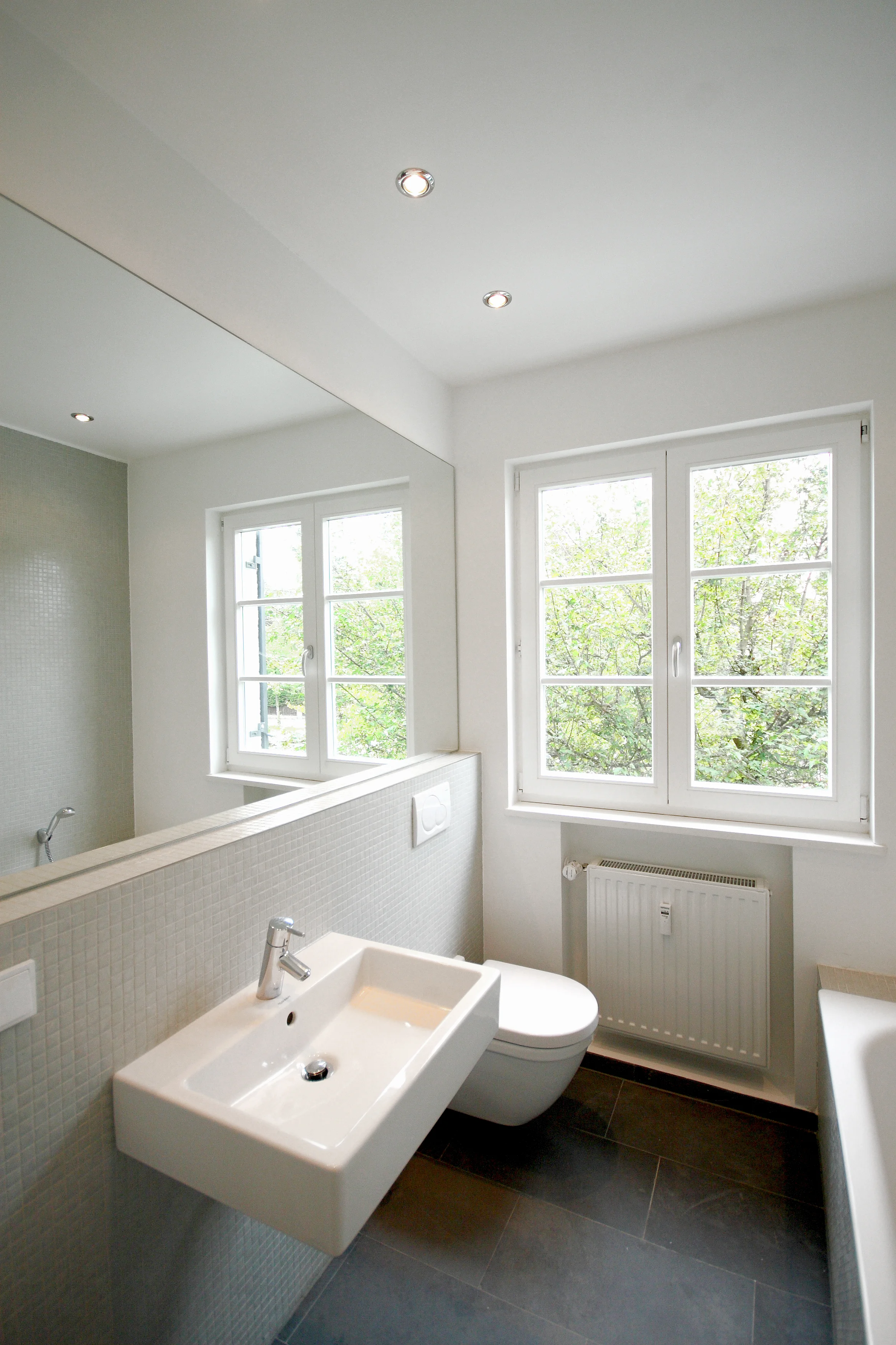 Umbau eines Reihenendhauses mit kieferorthopädischer Praxis, München-Harlaching, 2009