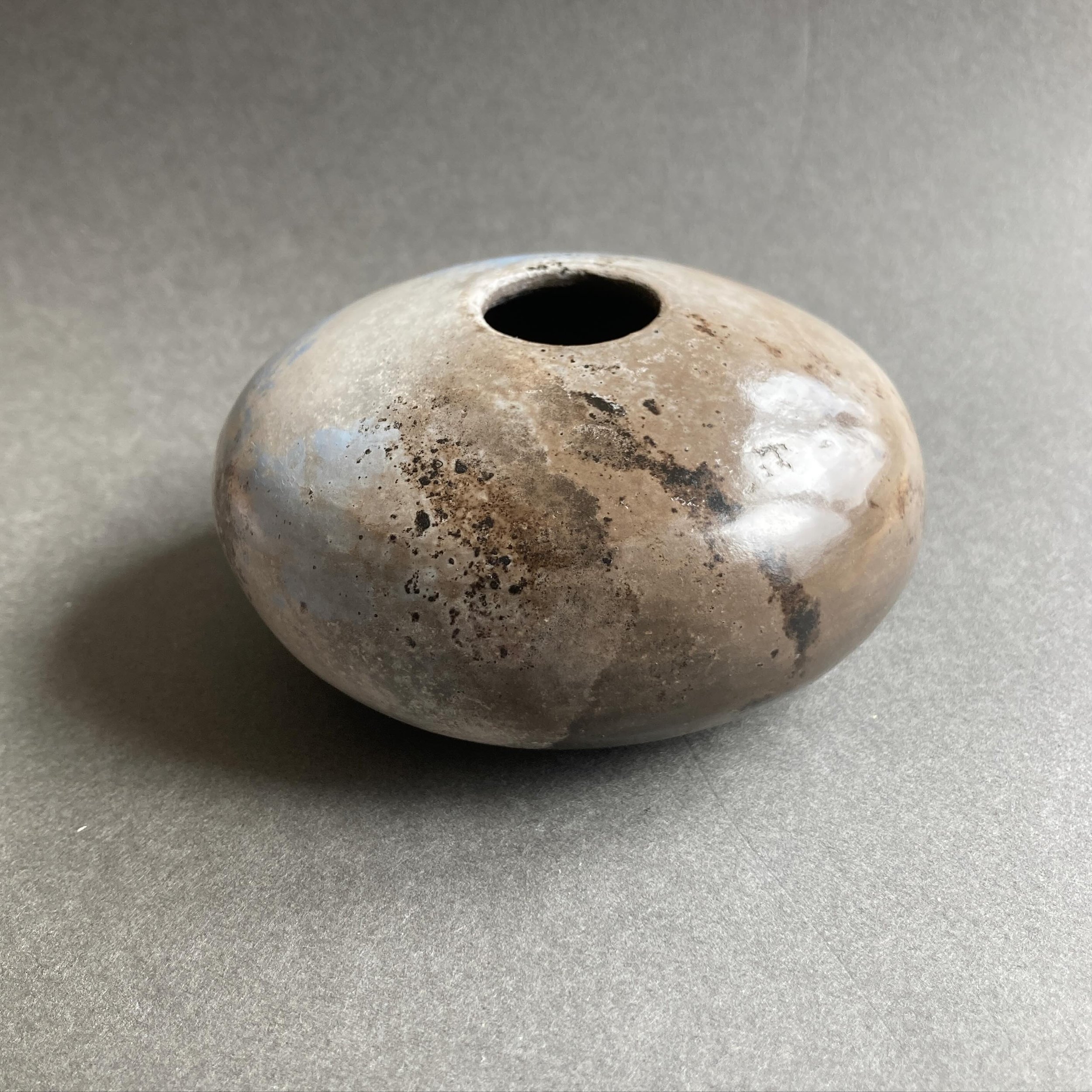 Small burnished and smoke fired work by Guild member @francesmarr 

&lsquo;My intention is to create engaging works that celebrate our landscapes and are rooted in the environment. The fragments, found on my walks along our crumbling coastlines, hint