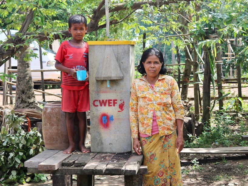  Cambodian mother and son with their new BioSand Water Filter 