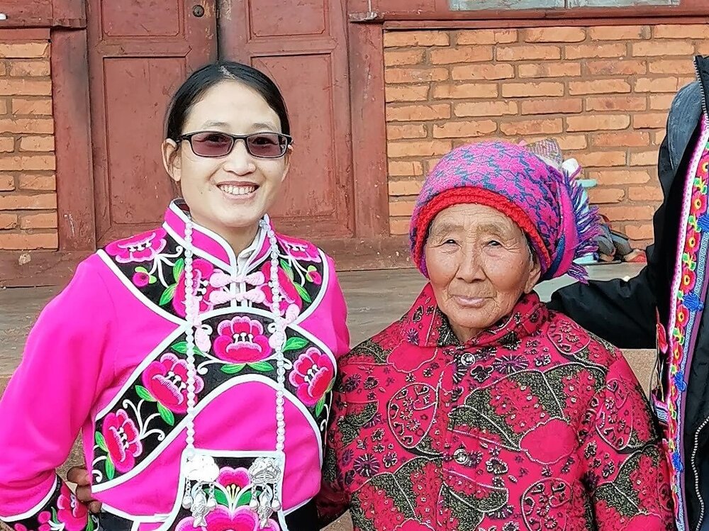 CWEF’s Jenny with an elderly woman in Yanmaidi