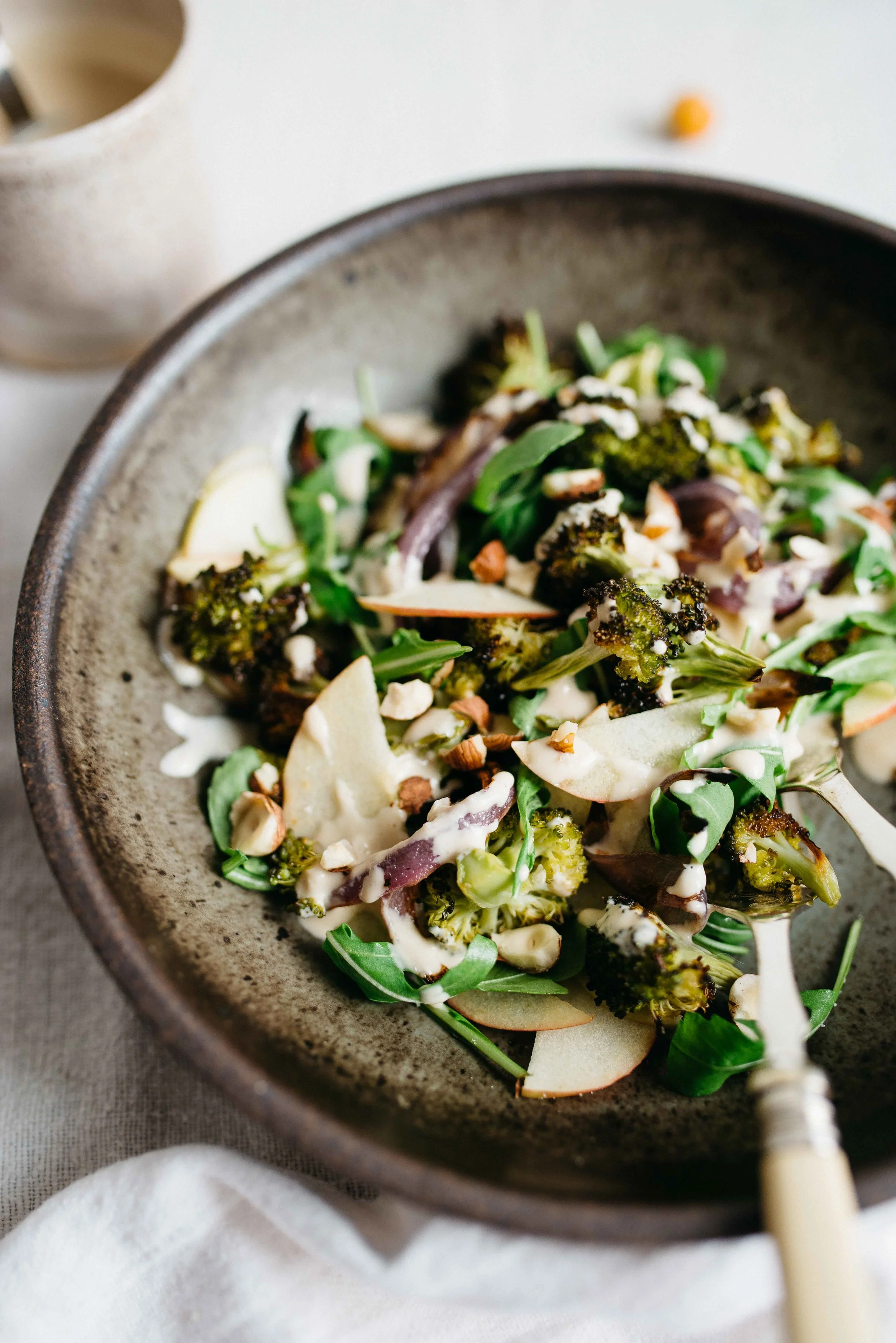 charred broccoli + red onion salad w/ shaved apples + arugula | dolly and oatmeal