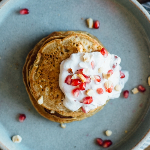 oat pancakes w/ pomegranate yogurt