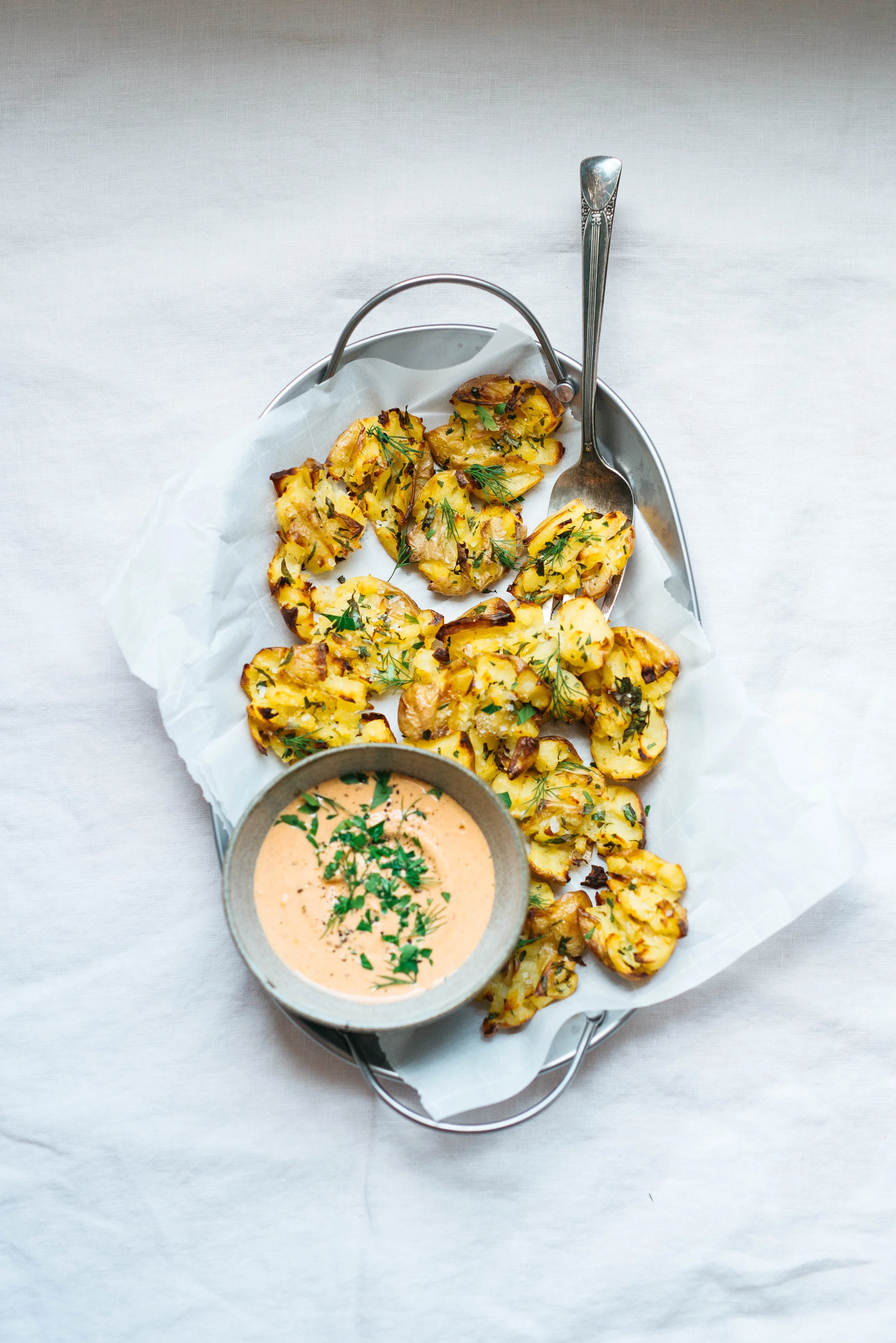 Salty Smashed Potatoes w/ Harissa Yogurt Sauce | Dolly and Oatmeal