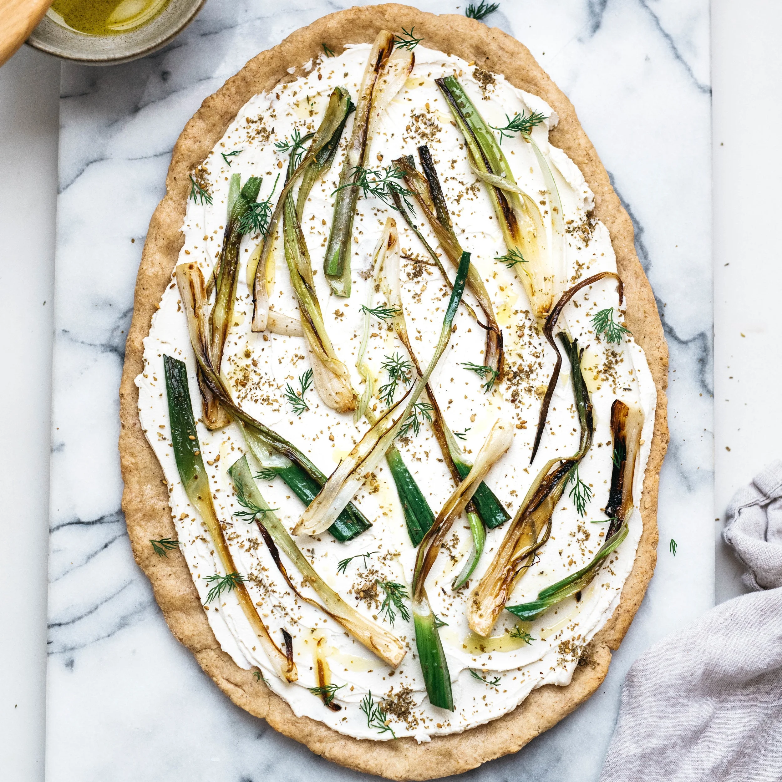 charred green onion &amp; labneh flatbread