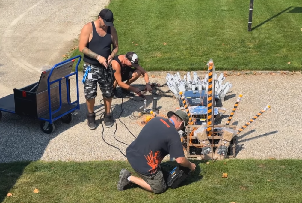 Firemaster Production Technicians building a firework display on-site