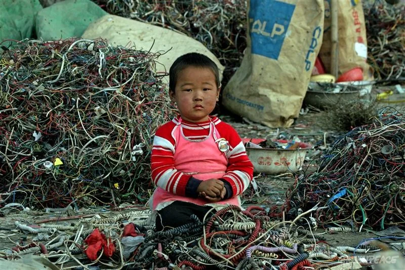 Most of our electronic waste ends up in China, where impoverished families mine it for small amounts of copper and gold.