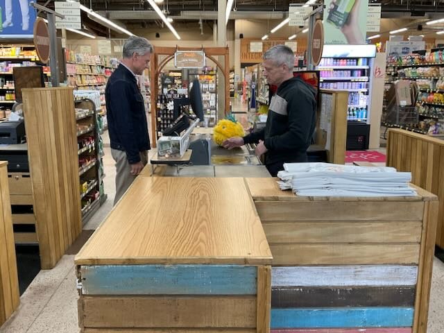  There’s BIBERTY, speaking to his friend, the customer. 