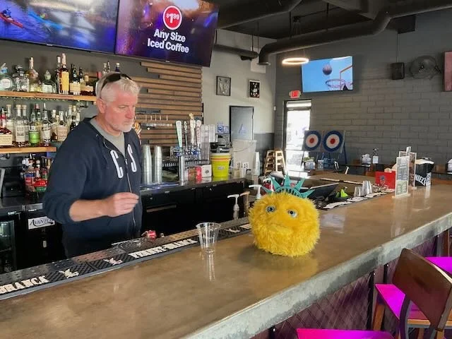   BARTENDER: “Your name’s Liberty Biberty?”  