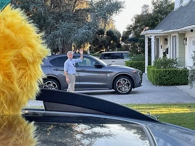  …to the NEIGHBOR next door, who waves and says…   NEIGHBOR: “Hey, Biberty.”  