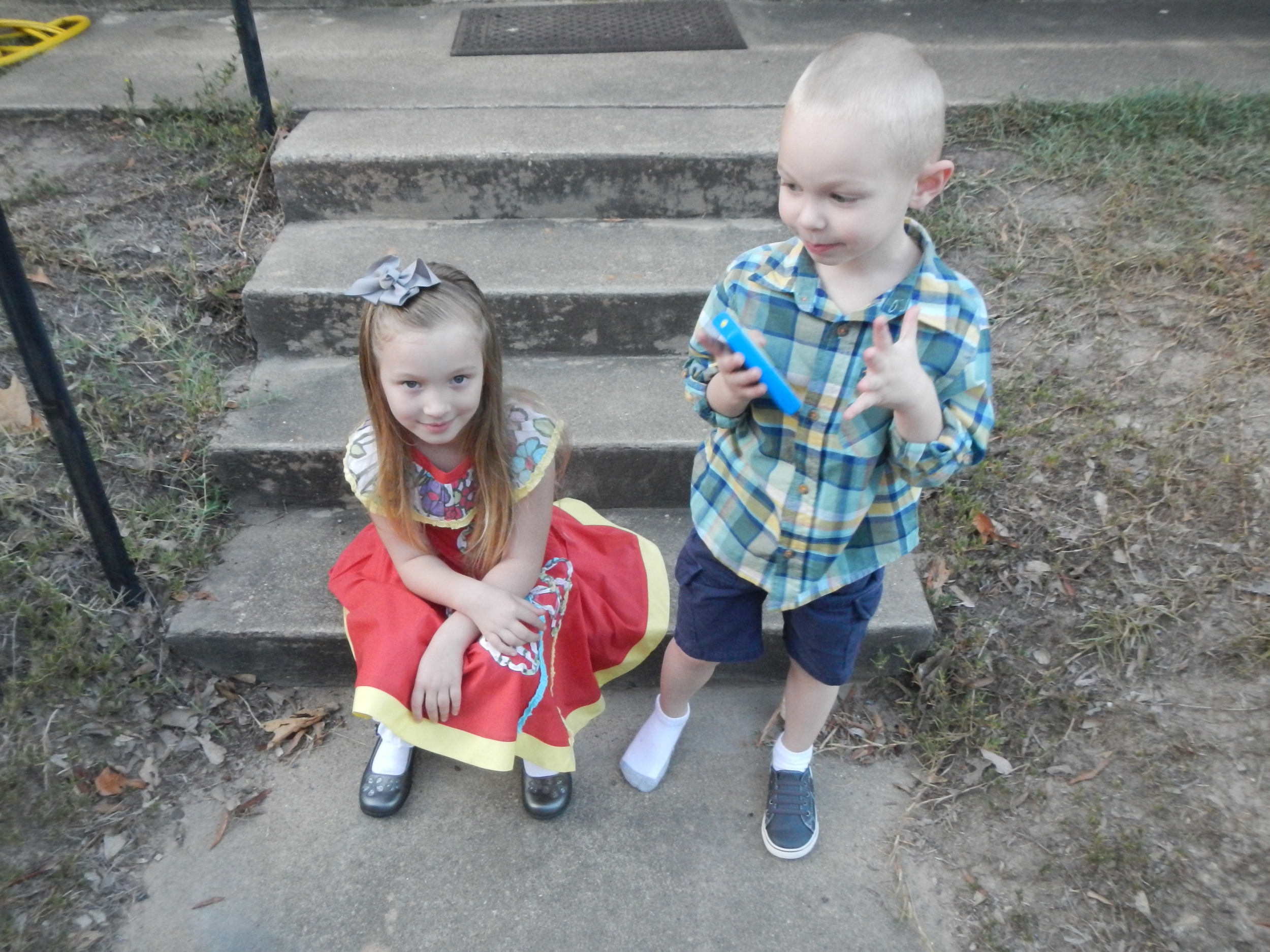  Oh dear, Ezra has already lost a shoe! &nbsp;Now Grace is giving me the Mom-has-taken-a-bazillion-pictures-already look.  