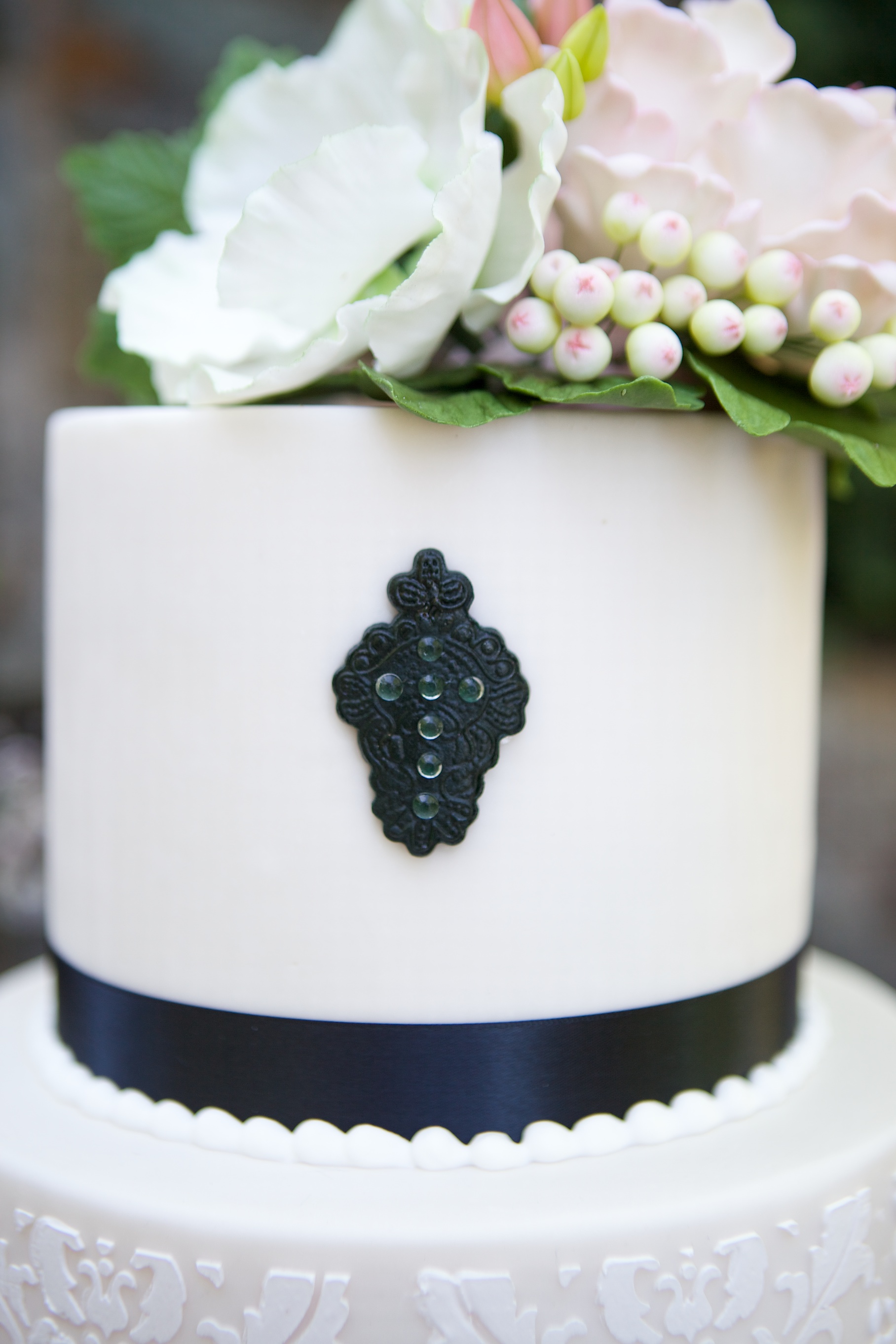 Randy Jackson Photography..."Sugar flower topper with anemones, roses, peonies, berries and greens"