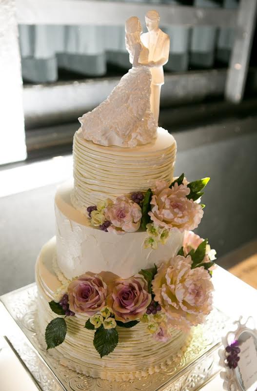 jessiesphotos.com .... "Buttercream ruffles with sugar peonies, hydrangeas, and vintage roses"