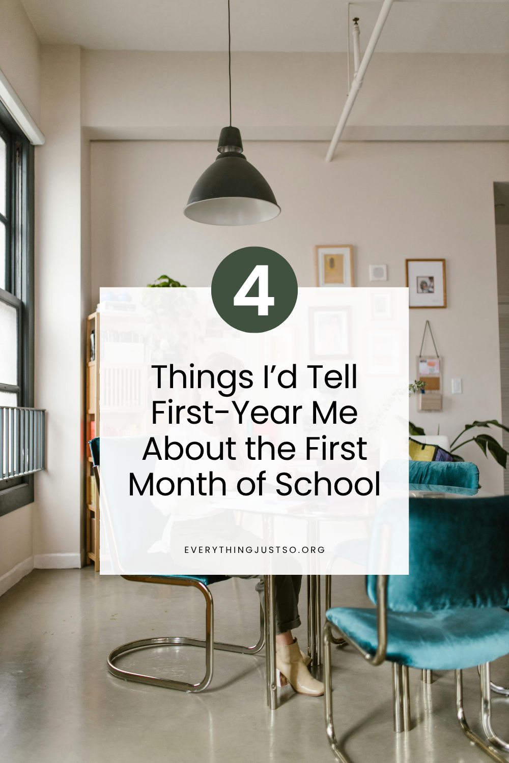 A teacher sitting at a table planning for the first day of school.