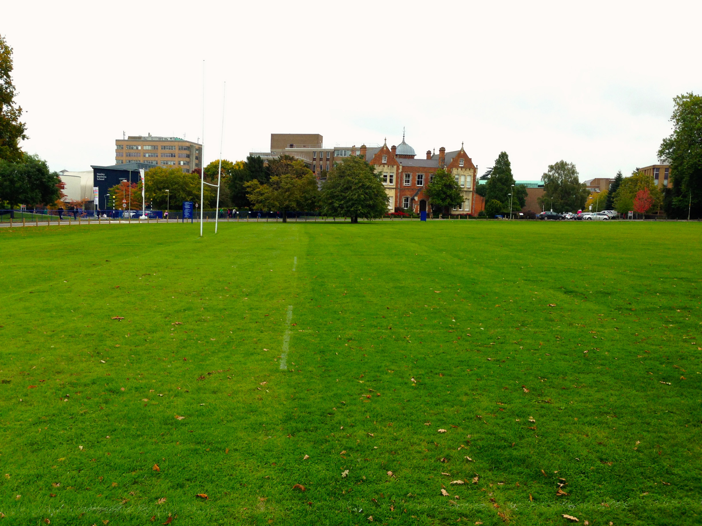 Walking across the football pitch to class