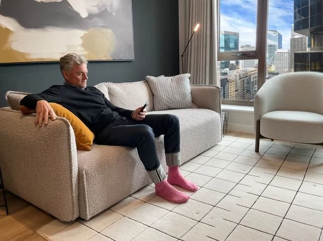  …like this. We’ll bring in a different couch—one the SNAKE can fit under—a different chair, a coffee table, a different rug, and some additional key props to help convey we’re in AUSTRALIA. 