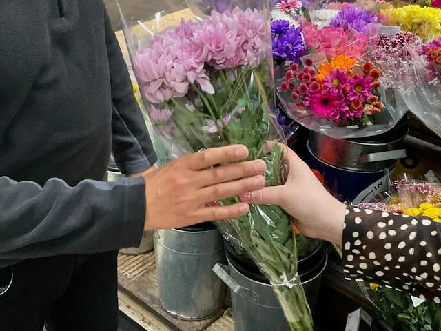  And, yes…a CLOSE-UP of a BEAUTIFUL BOUQUET of FLOWERS being placed into a pair of waiting HANDS.  CUT… 
