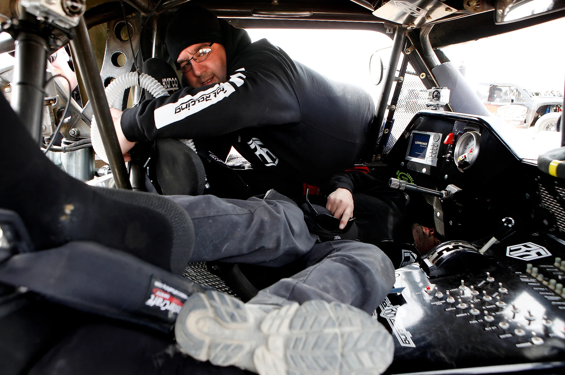  Mechanics scramble to diagnose an issue and ready the truck for a race in a few hours in Laughlin, Nevada. 