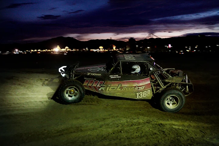  Bree Cloud and Sam Richard corner a silty patch of the race course near the tail end of their last lap.&nbsp; 