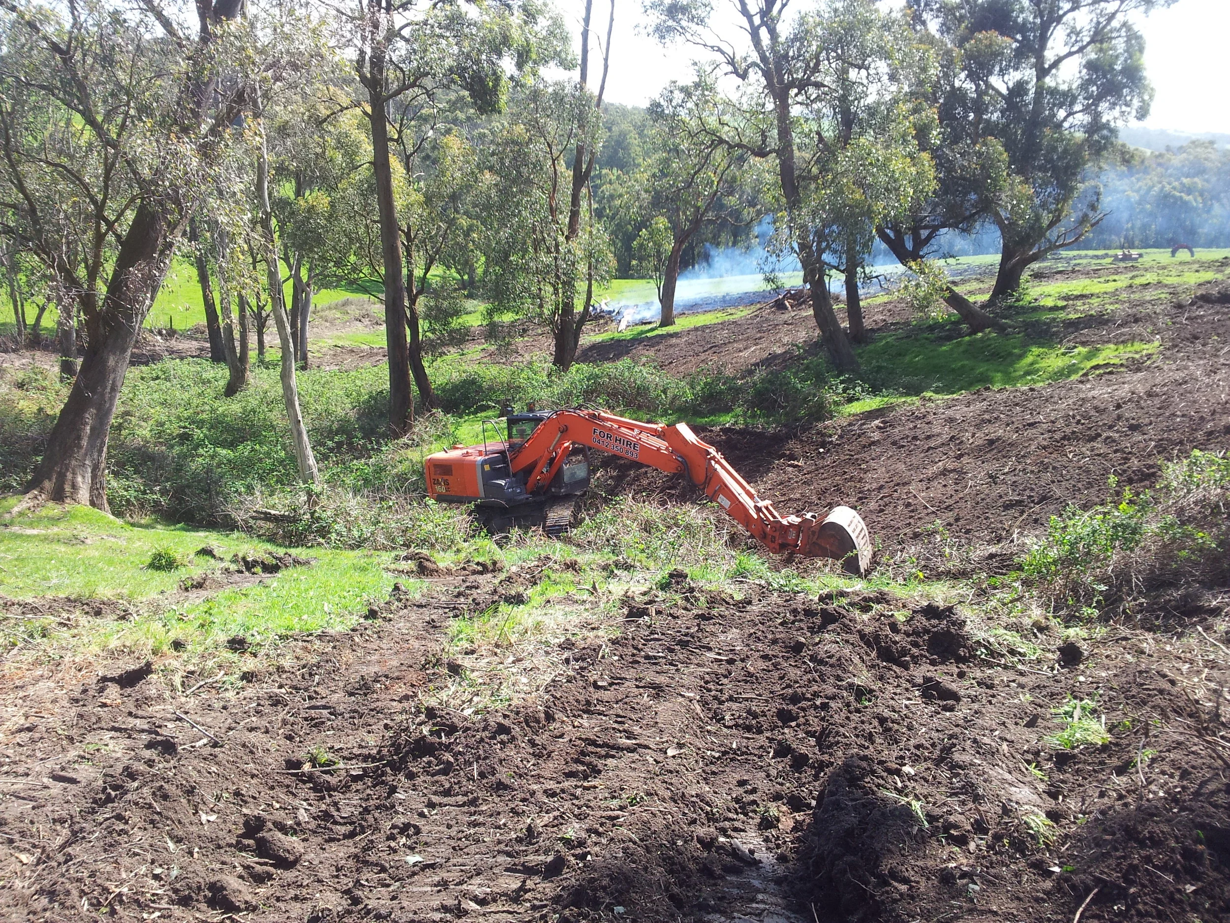 Removal of blackberries, tree stumps and erosion protection. 