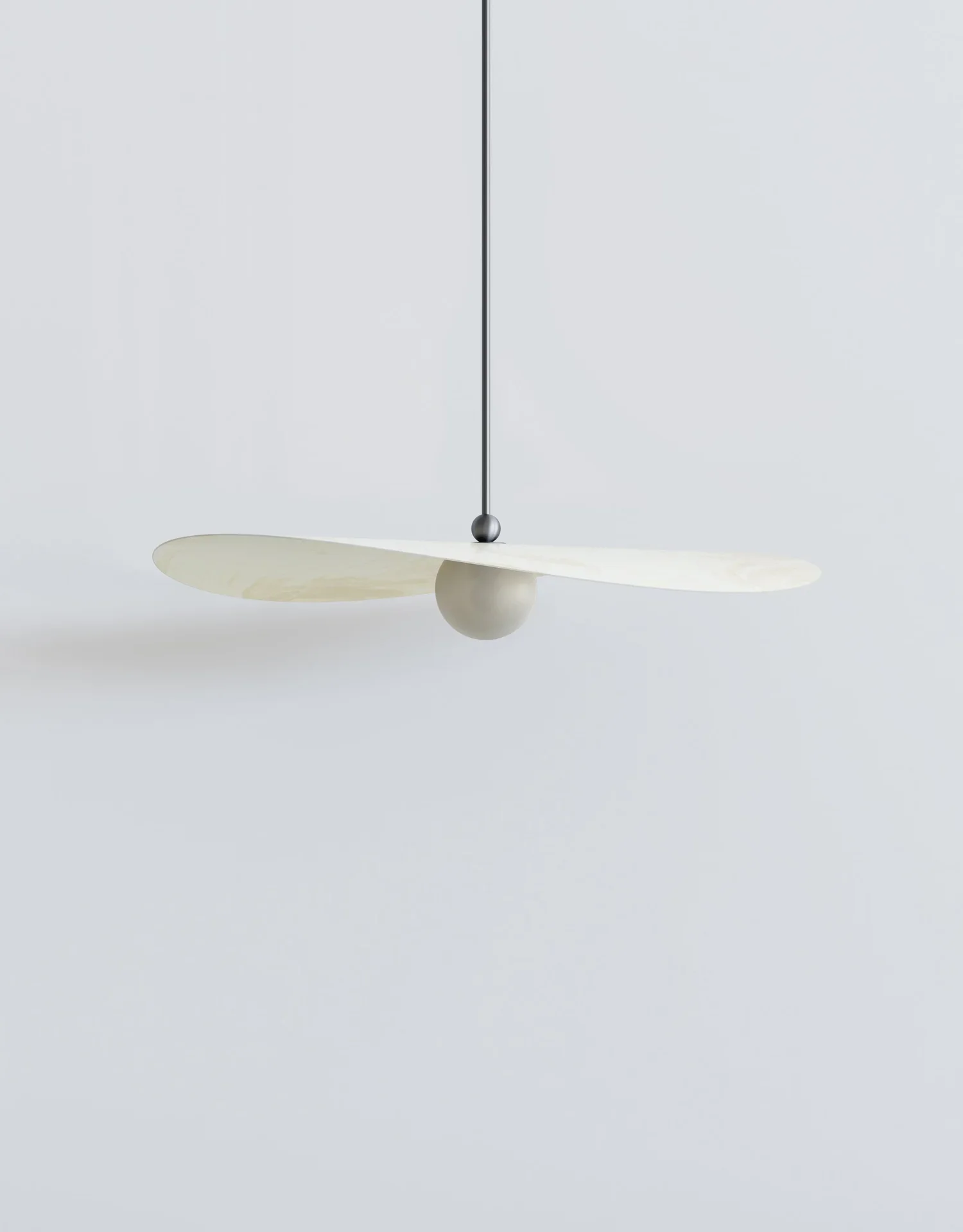 Myrna Pendant in medium size marbled amber glass shade and blackened metal hardware.