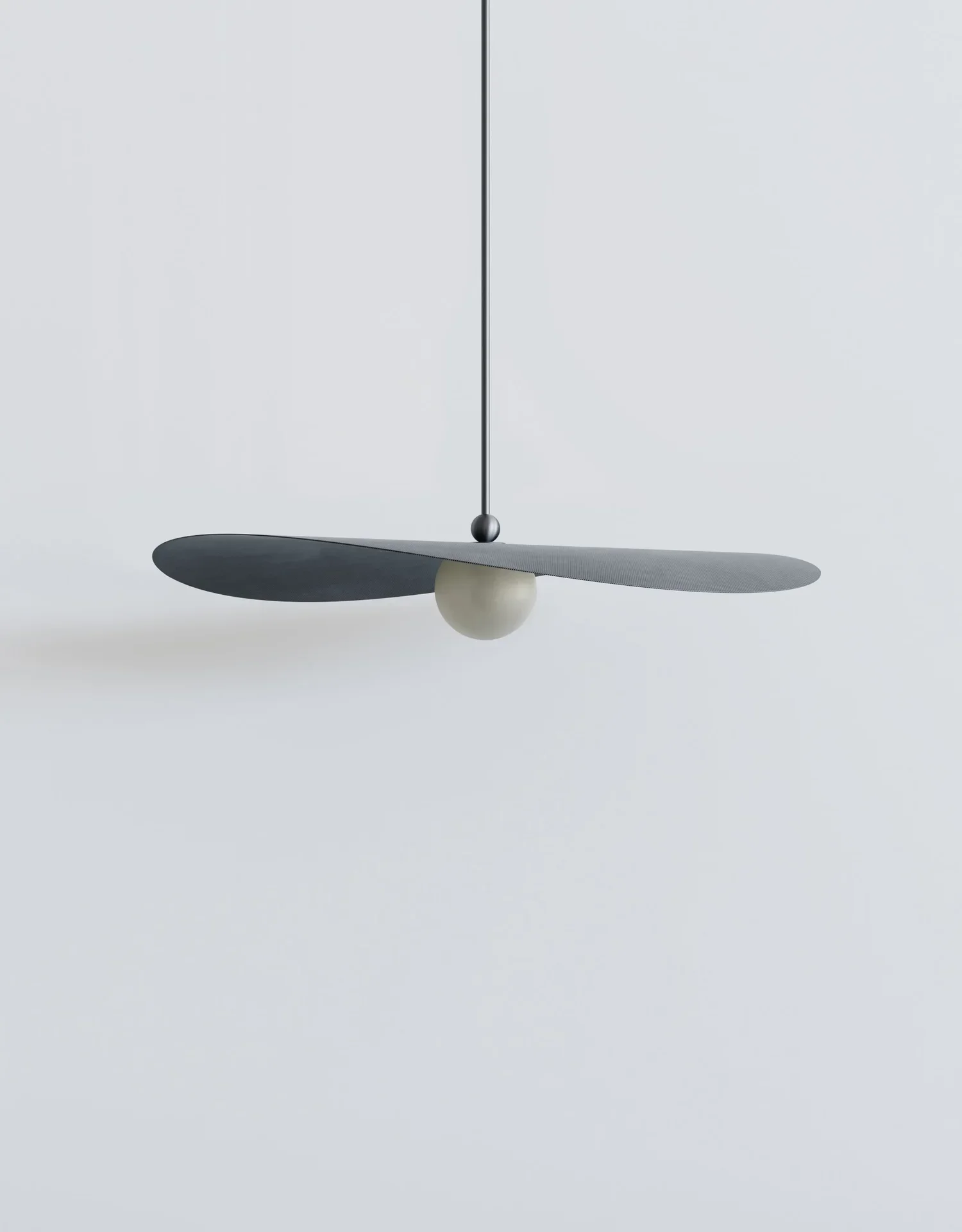 Myrna Pendant in medium size perforated smoke metal shade and blackened metal hardware.