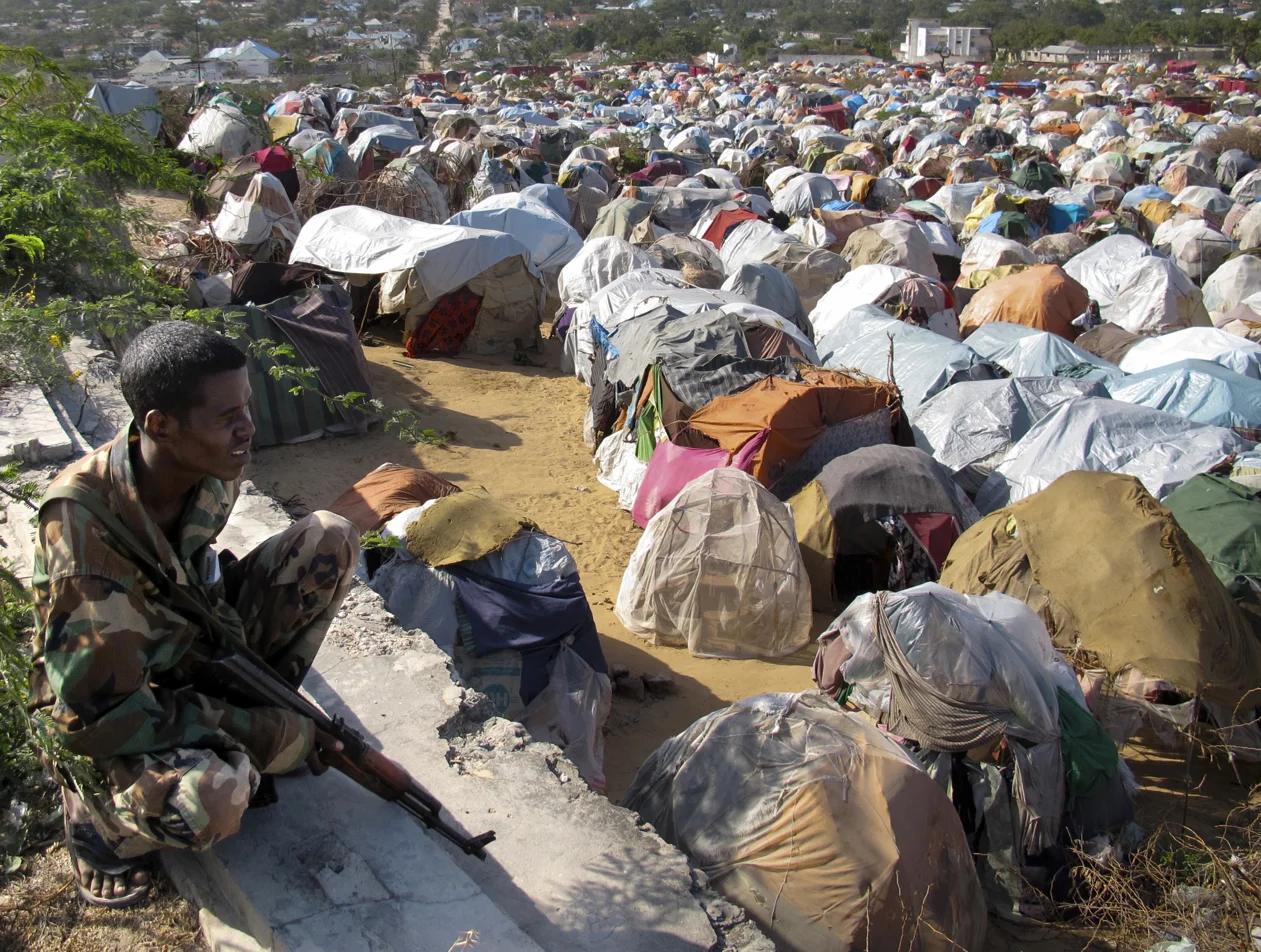 Soldier. Parliament IDP camp, Mogadishu, Somalia. August 2011.