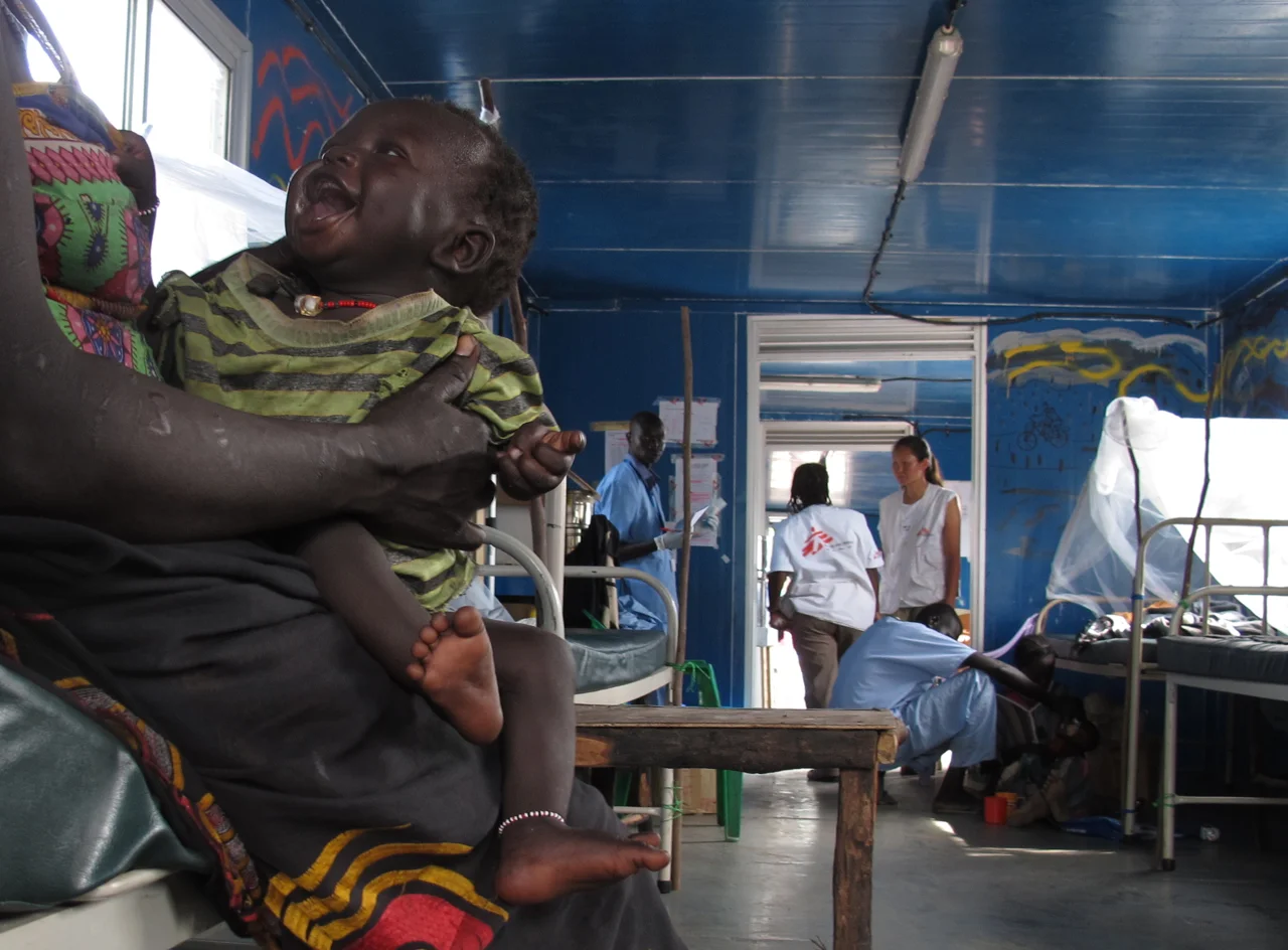 Smile. Médecins Sans Frontières field clinic, Doro refugee camp, Maban county, South Sudan. September 2012.