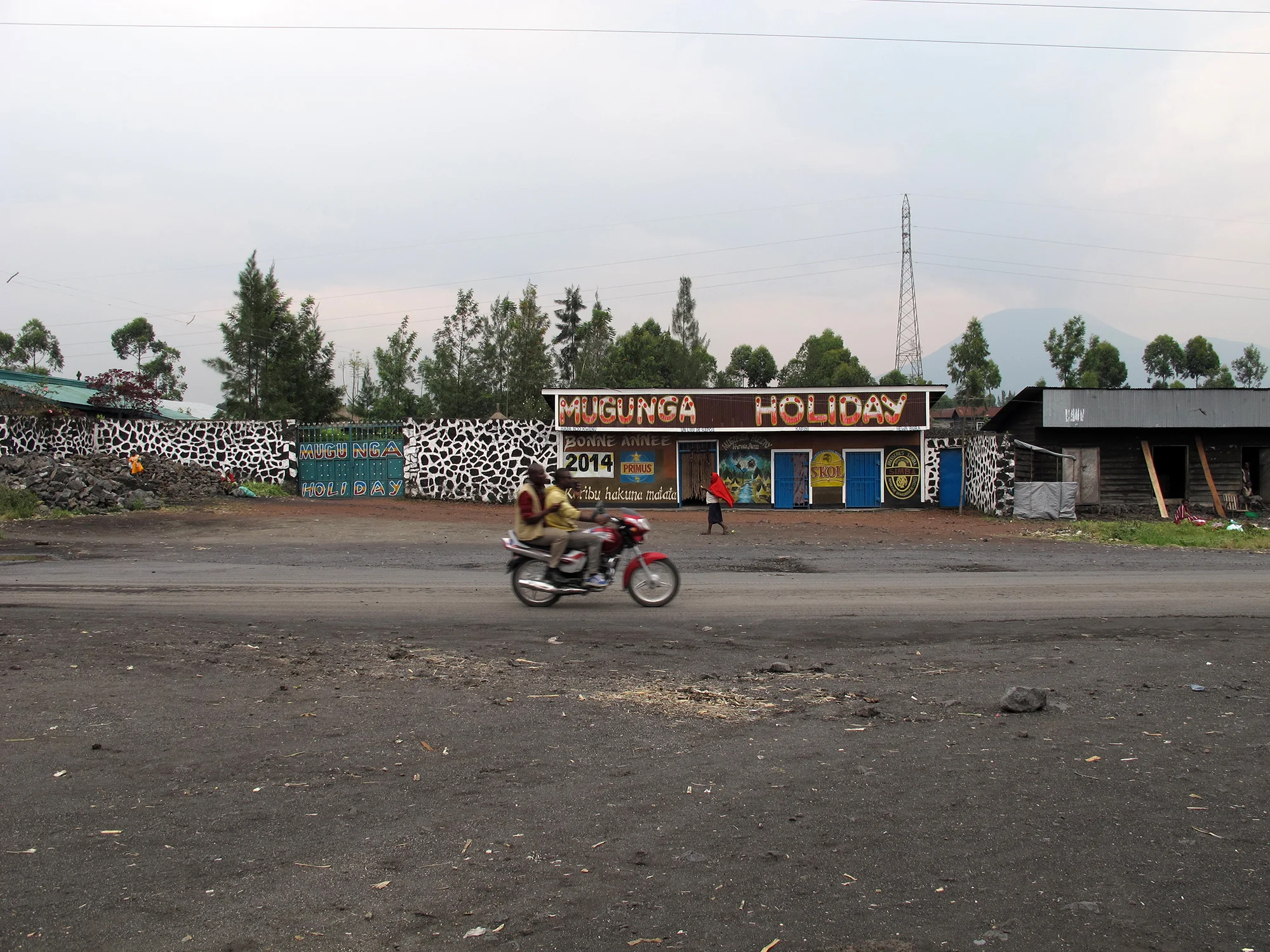 Holiday camp. Border of Mugunga III IDP camp, outskirts of Goma, Demcratic Republic of Congo. January 2014.