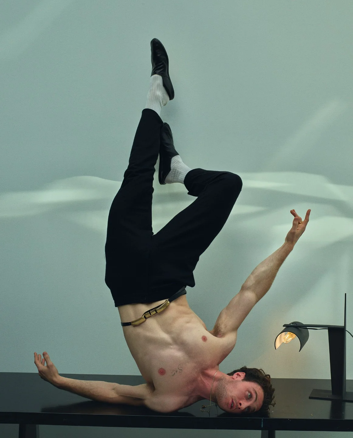 AARON TAYLOR-JOHNSON STYLED BY GEORGE CORTINA PHOTOGRAPHY BY MARIO SORRENTI BELTS BY A. JASON ROSS