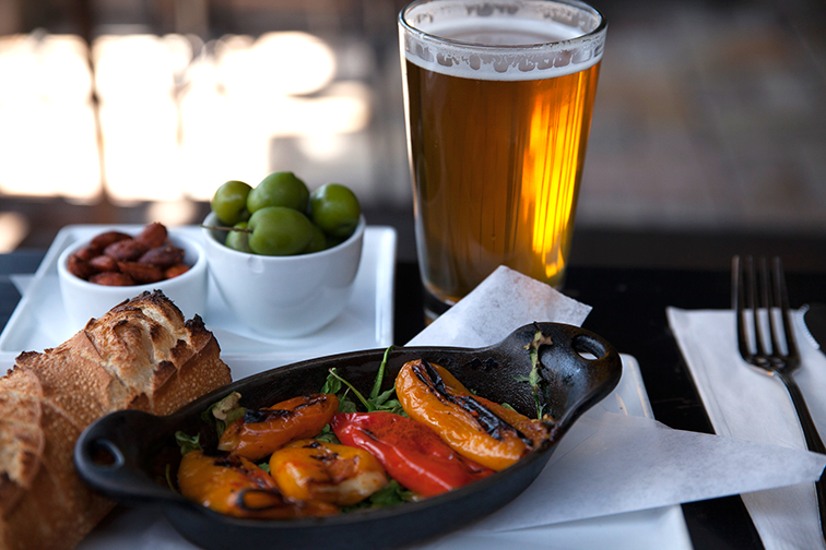 Manchego stuffed peppers, castelvetrano olive, and spiced almonds.