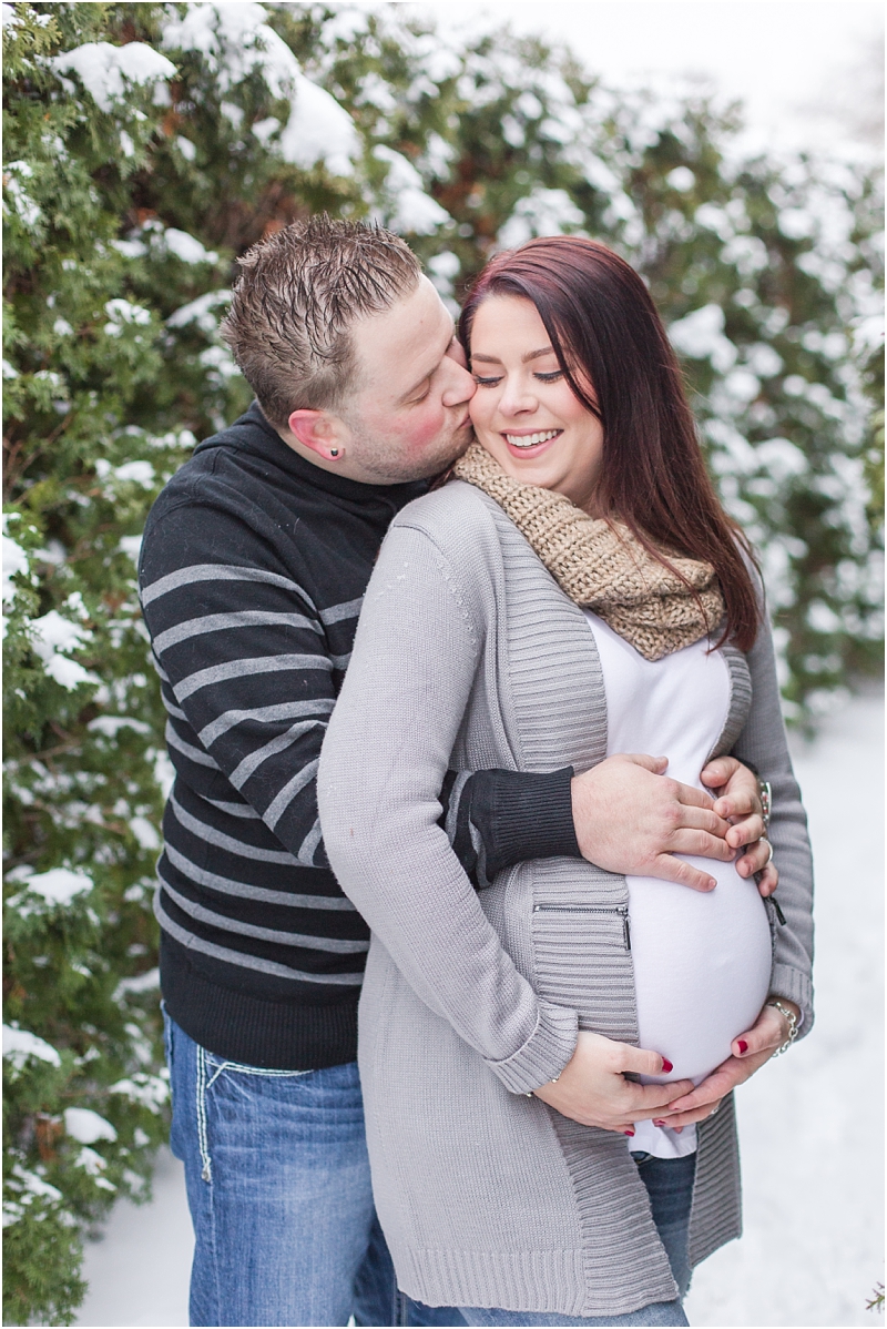 winter-maternity-portraits-in-rochester-mi-at-the-royal-park-hotel-by-courtney-carolyn-photography_0033.jpg
