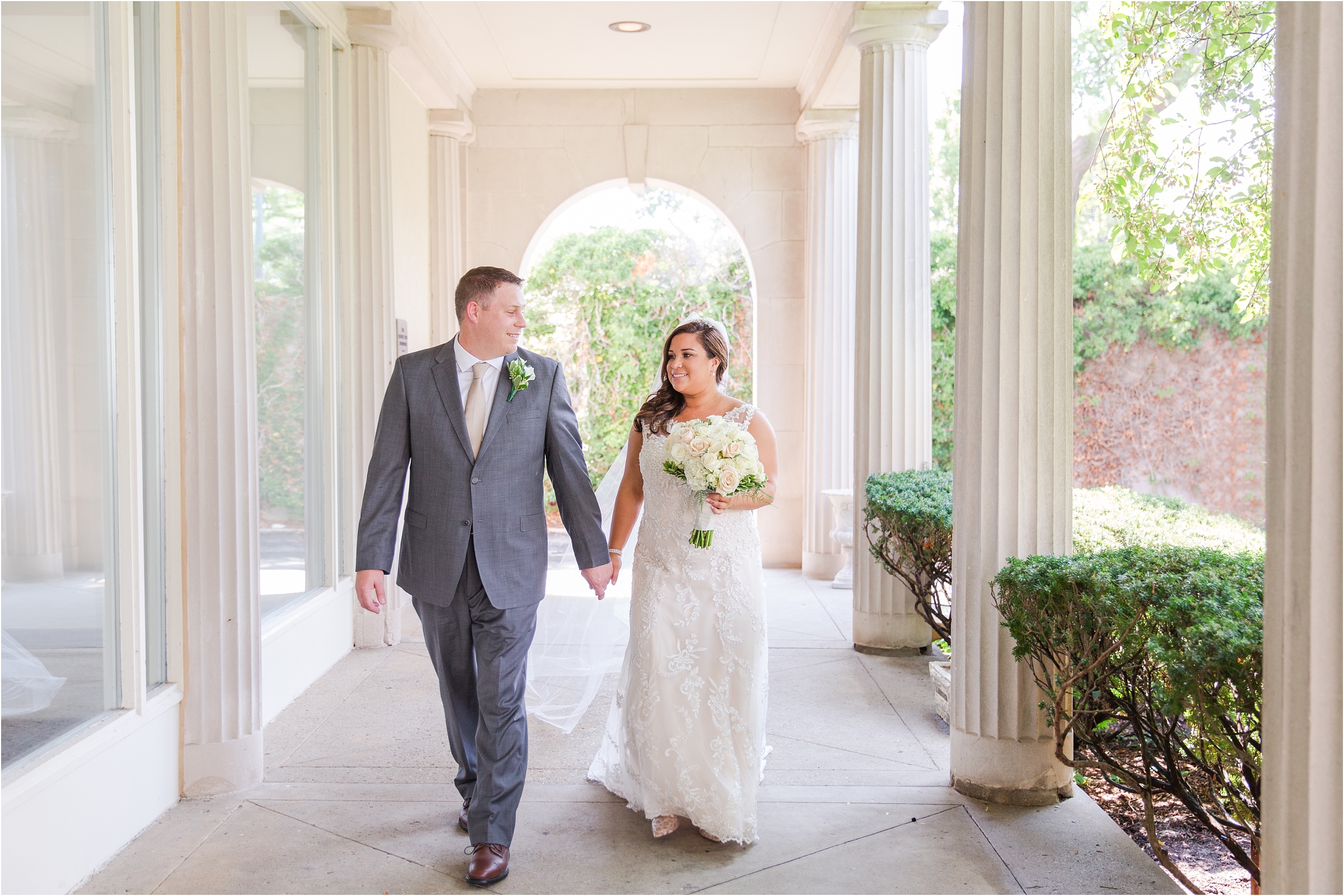 romantic-timeless-candid-wedding-photos-at-the-war-memorial-in-grosse-pointe-mi-by-courtney-carolyn-photography_0004.jpg