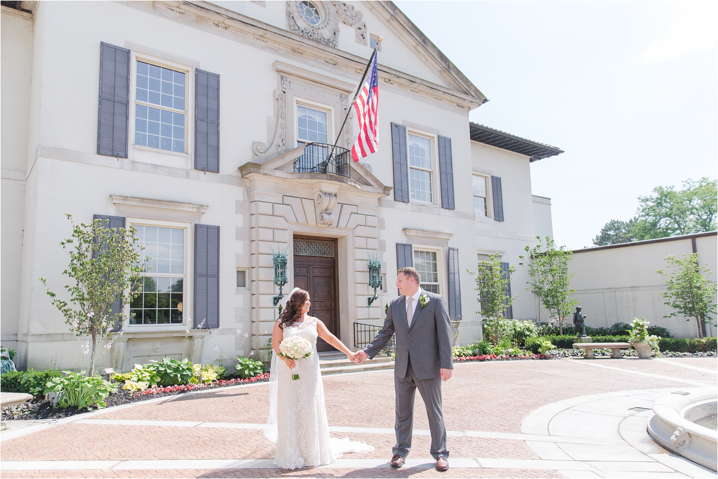 romantic-timeless-candid-wedding-photos-at-the-war-memorial-in-grosse-pointe-mi-by-courtney-carolyn-photography_0005.jpg