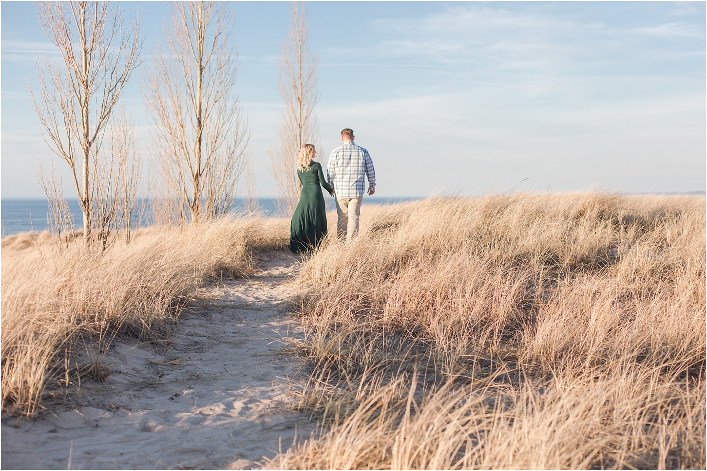 romantic-sunset-beach-engagement-photos-at-silver-beach-in-saint-joseph-mi-by-courtney-carolyn-photography_0004.jpg