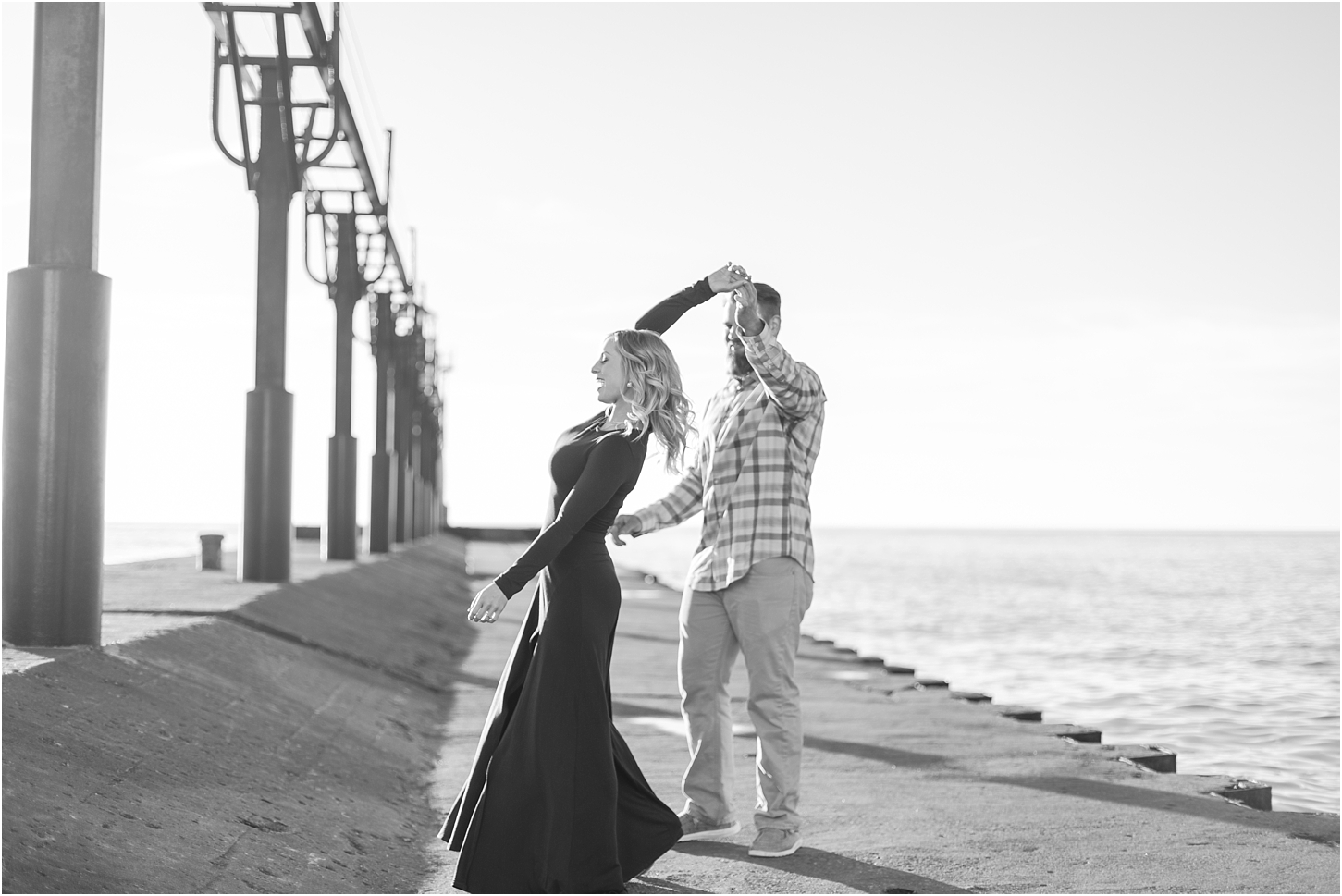 romantic-sunset-beach-engagement-photos-at-silver-beach-in-saint-joseph-mi-by-courtney-carolyn-photography_0011.jpg