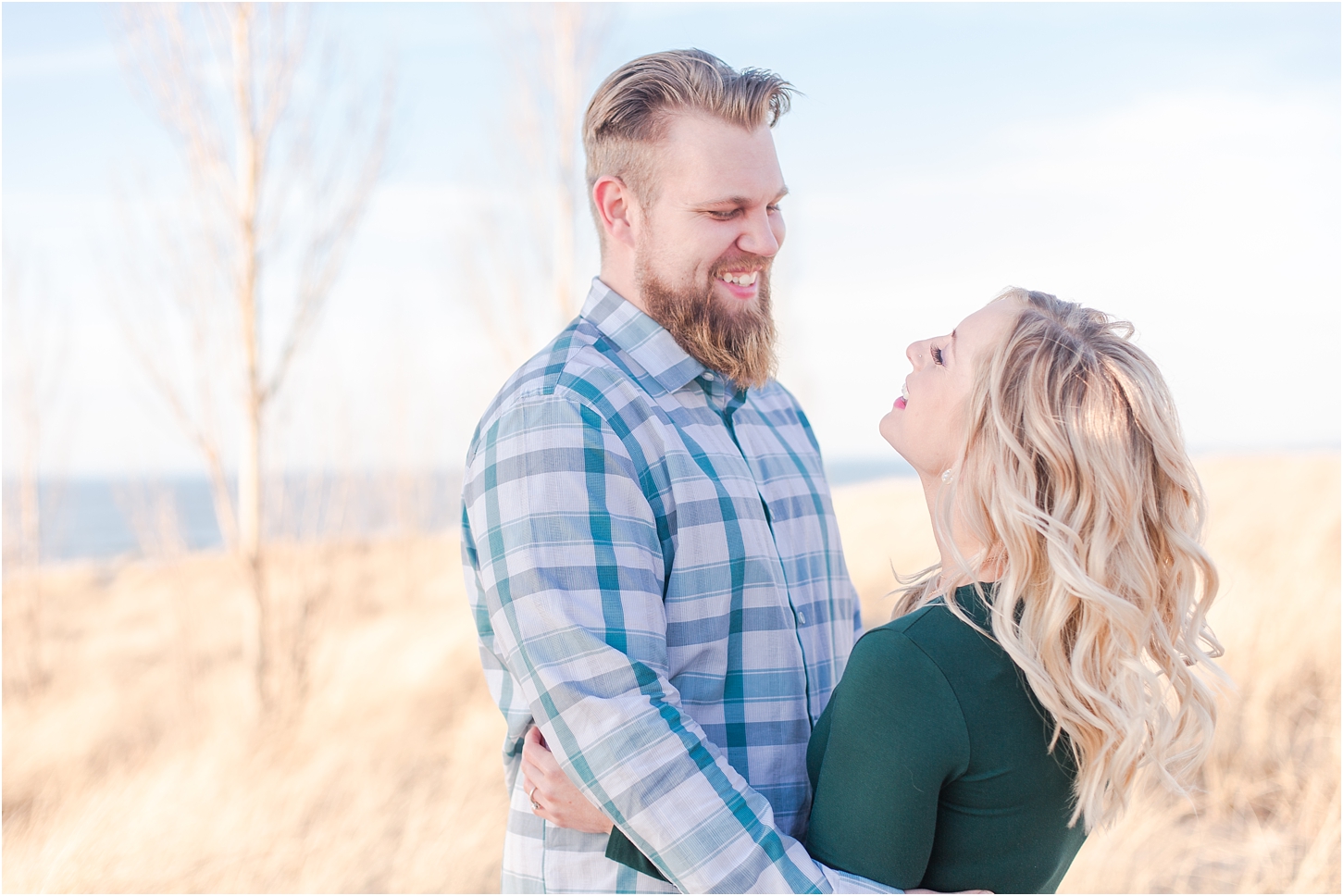 romantic-sunset-beach-engagement-photos-at-silver-beach-in-saint-joseph-mi-by-courtney-carolyn-photography_0012.jpg