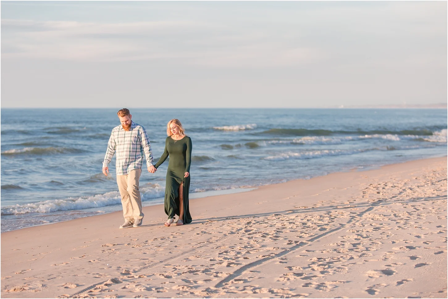 romantic-sunset-beach-engagement-photos-at-silver-beach-in-saint-joseph-mi-by-courtney-carolyn-photography_0034.jpg